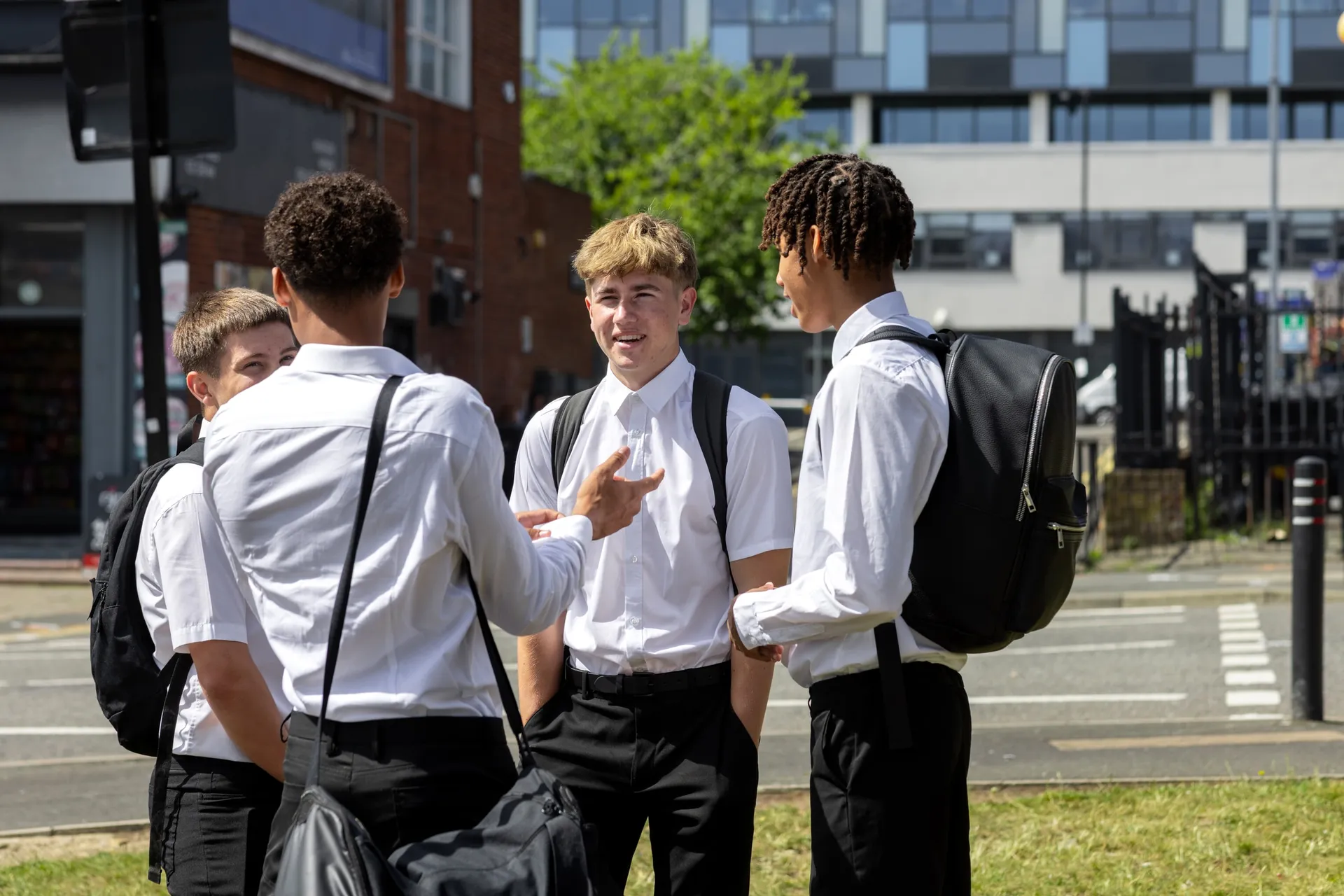 Vaughan College students talking together outdoors after school