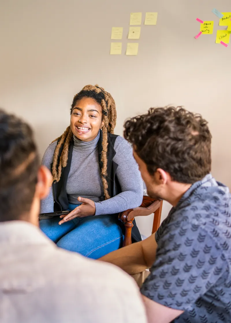 Students talking together in a seminar discussion